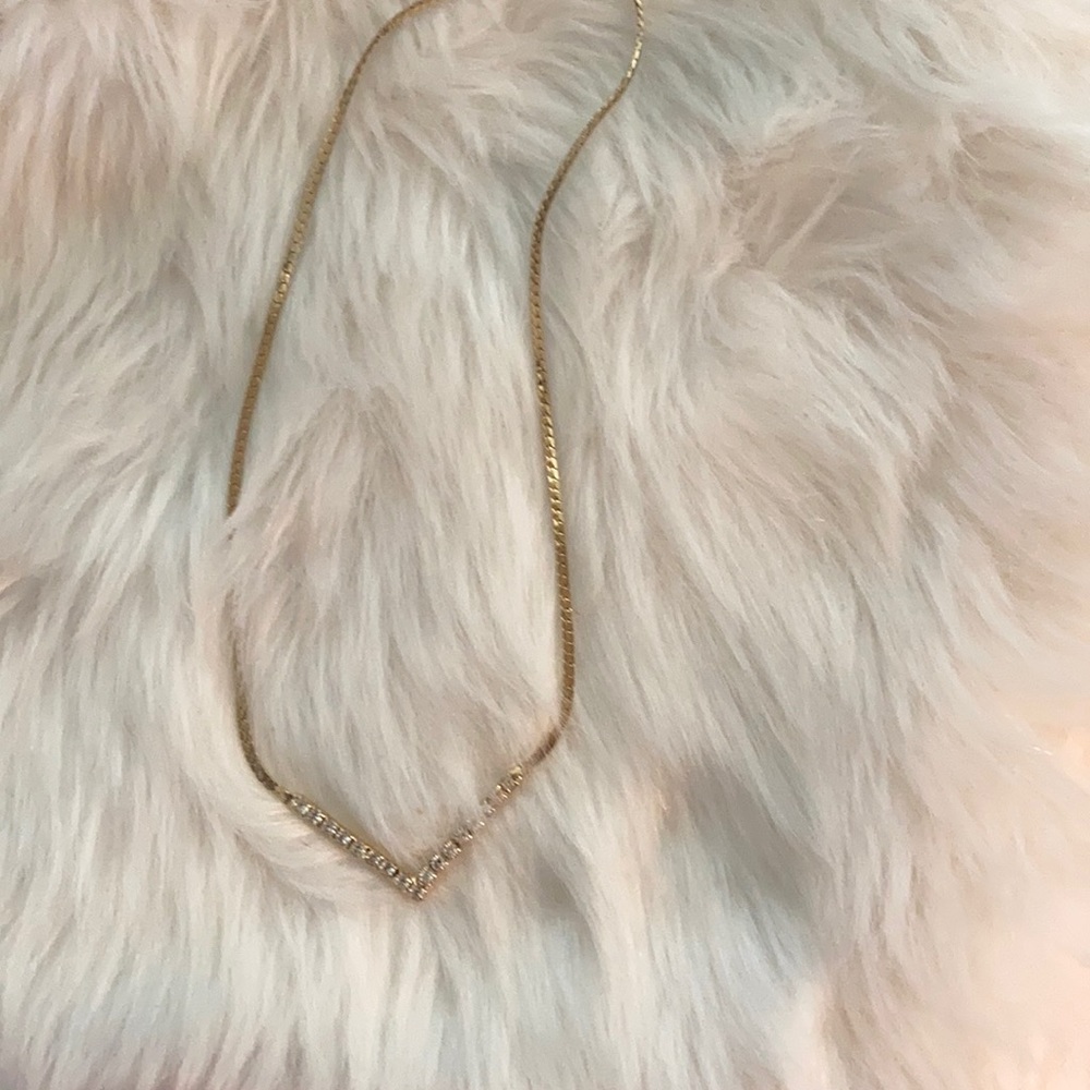 Vintage chocker gold v necklace with rhinestones.